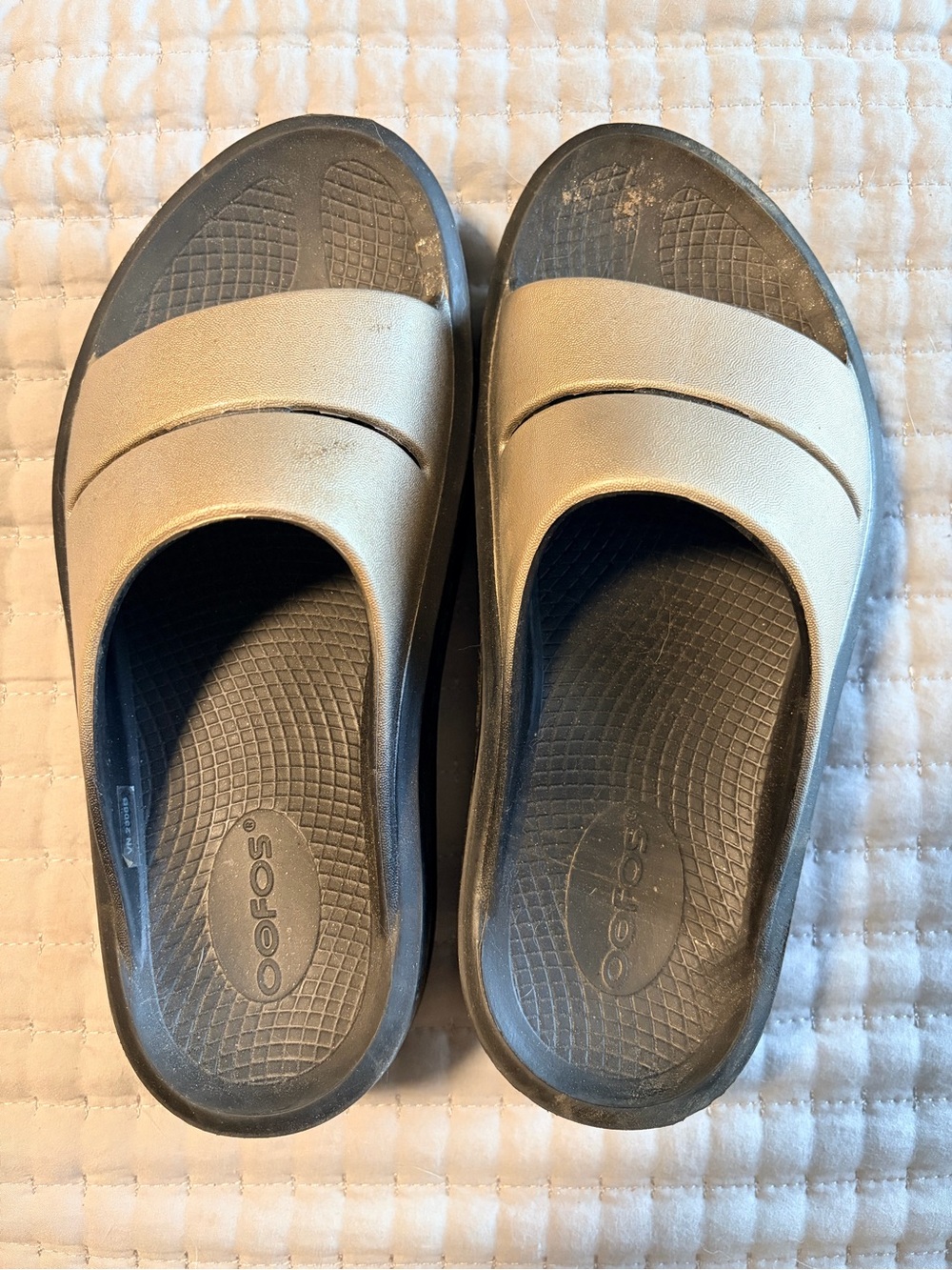 OOFOS Women's Slide Sandals in Beige and Black
